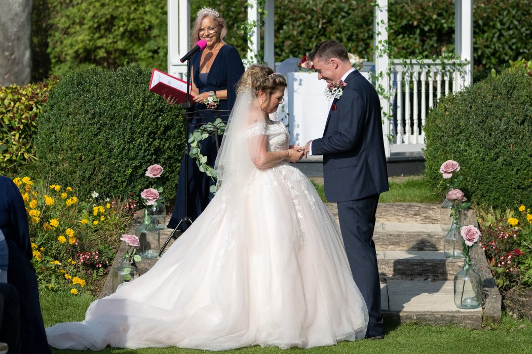 bridal couple with celebrant