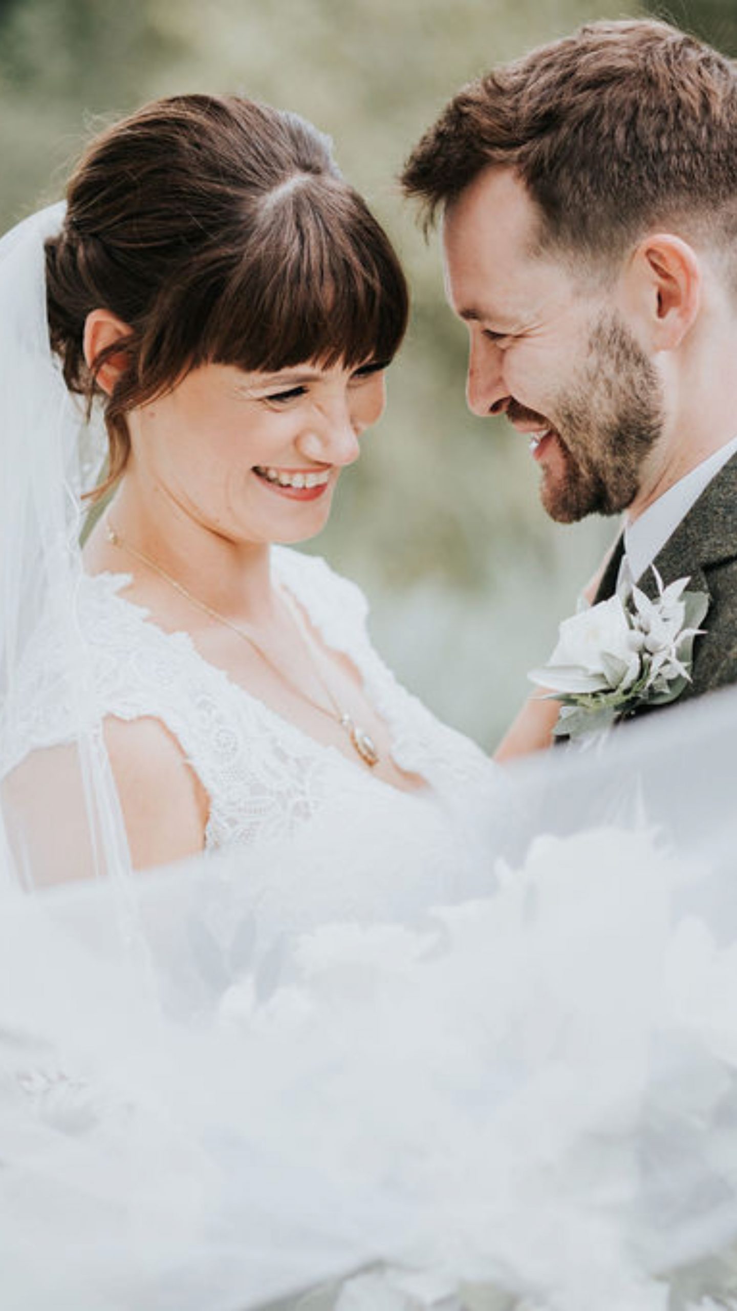 smiling bride and groom portrait