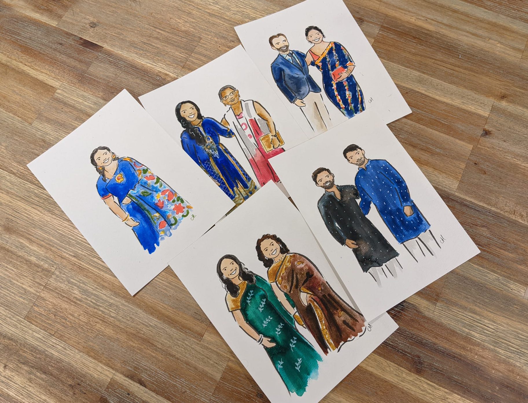 Table top with illustrations of wedding guests