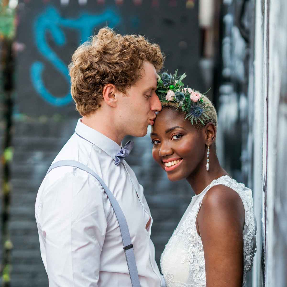 Stylish couple on wedding day, jewellery by Catherine Marche
