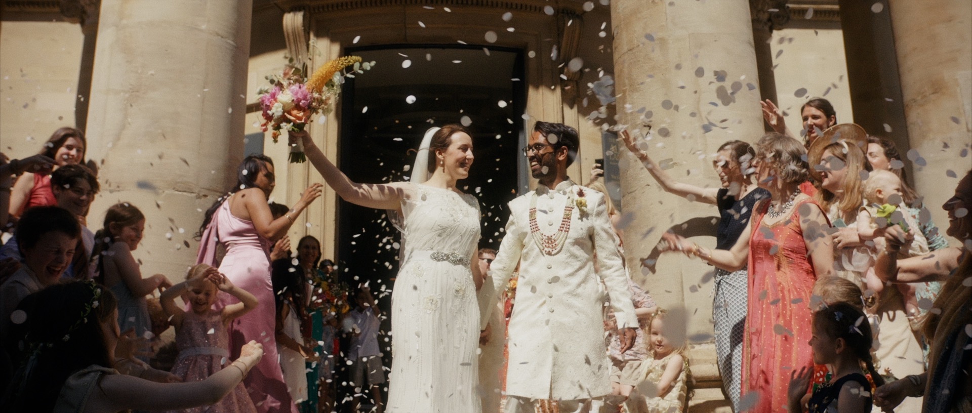 confetti shot of bridal couple