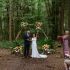 bride and groom surrounded by sunflowers
