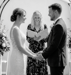 celebrant with bridal couple