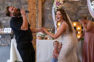 waiter singing to the bride