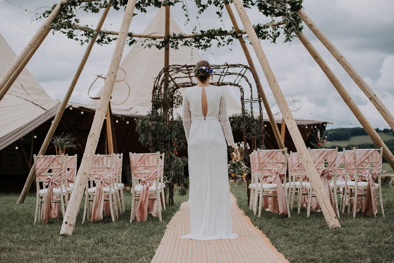 bride at outdoor aisle