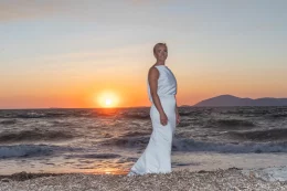bride on beach at sunset