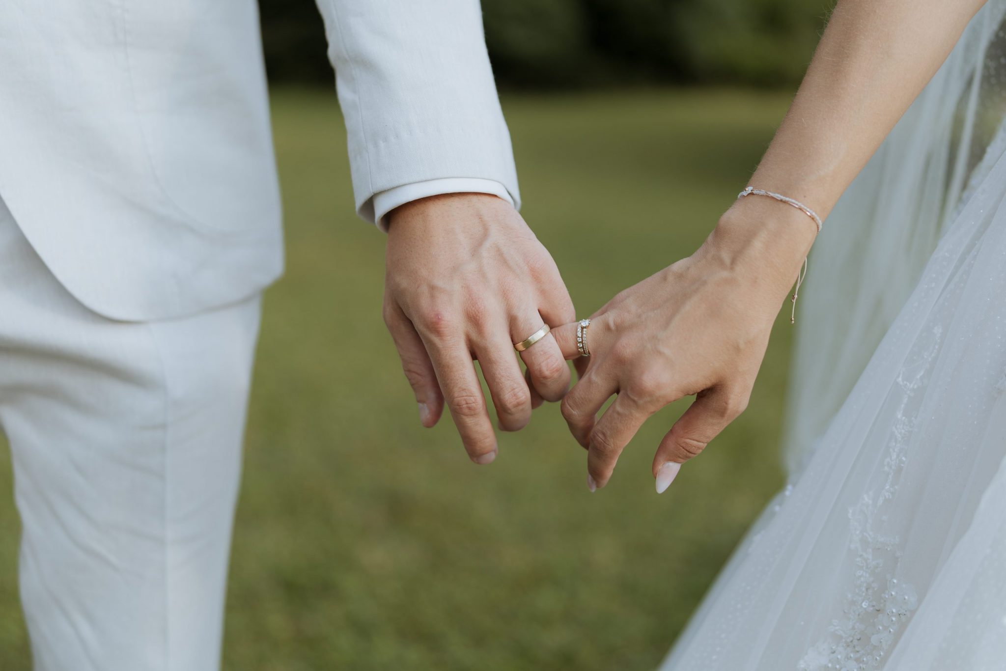 wedding-rings-hands-close-up