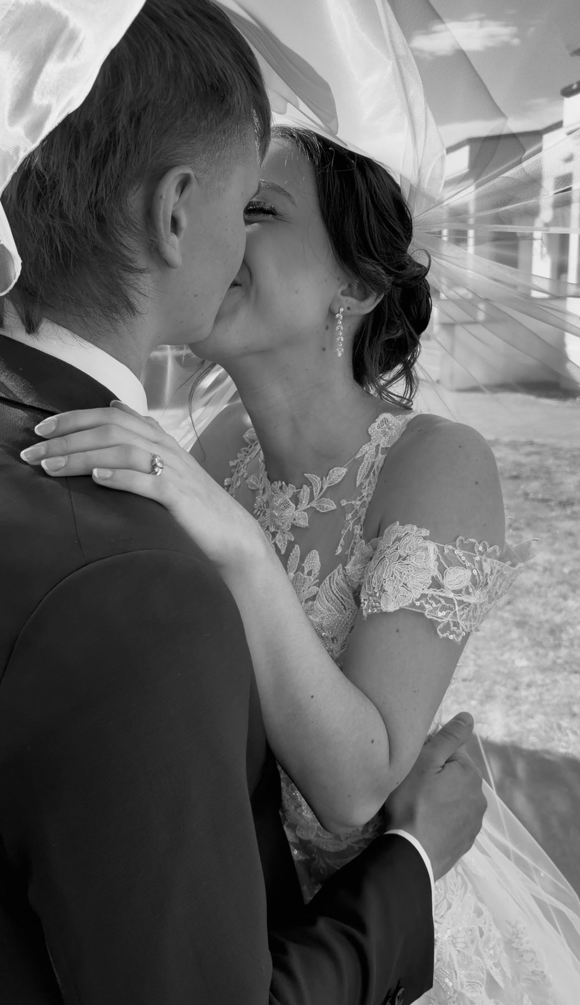 bride and groom kissing