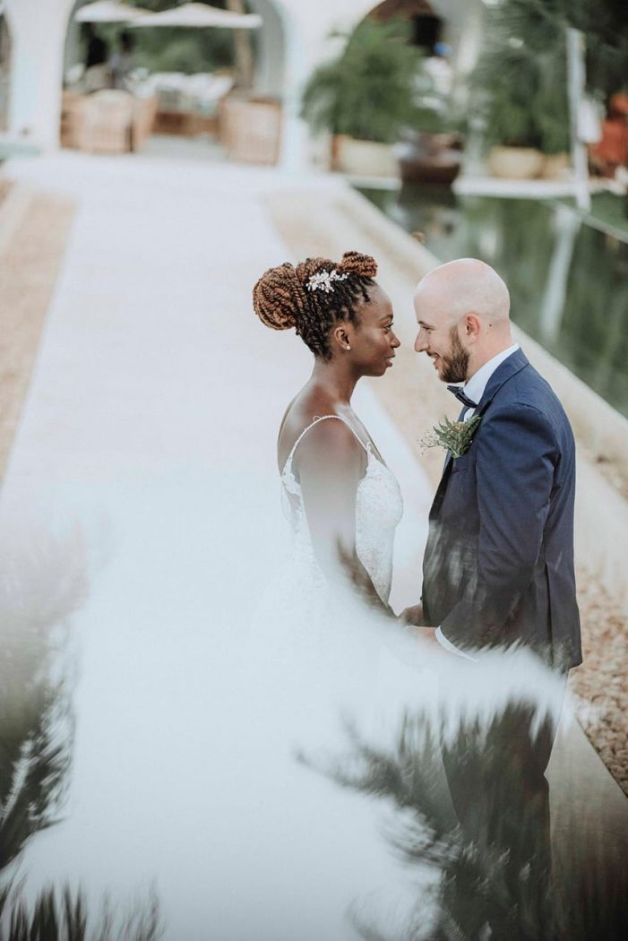 Bridal couple with veil