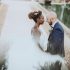 Bridal couple with veil